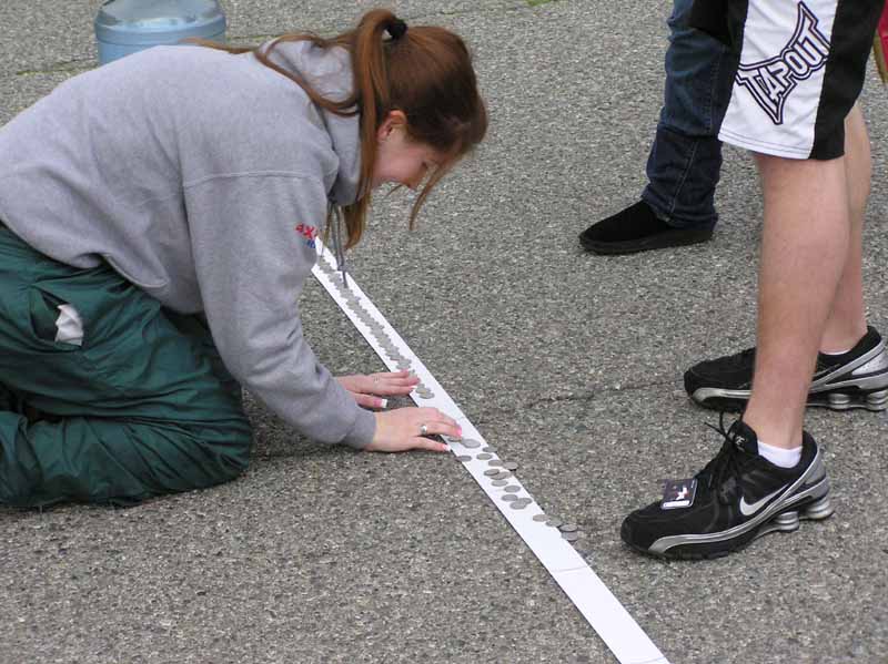 140-Trying to set the Guinness record for laying down a mile of quarters - This was a dry run